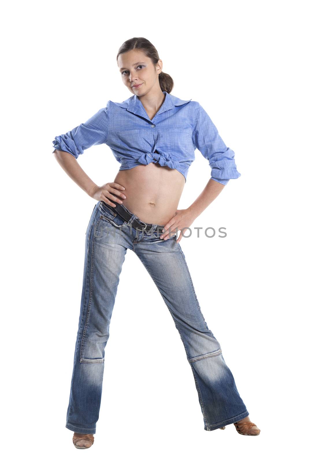 Young woman in jeans and short chemise isolated over white