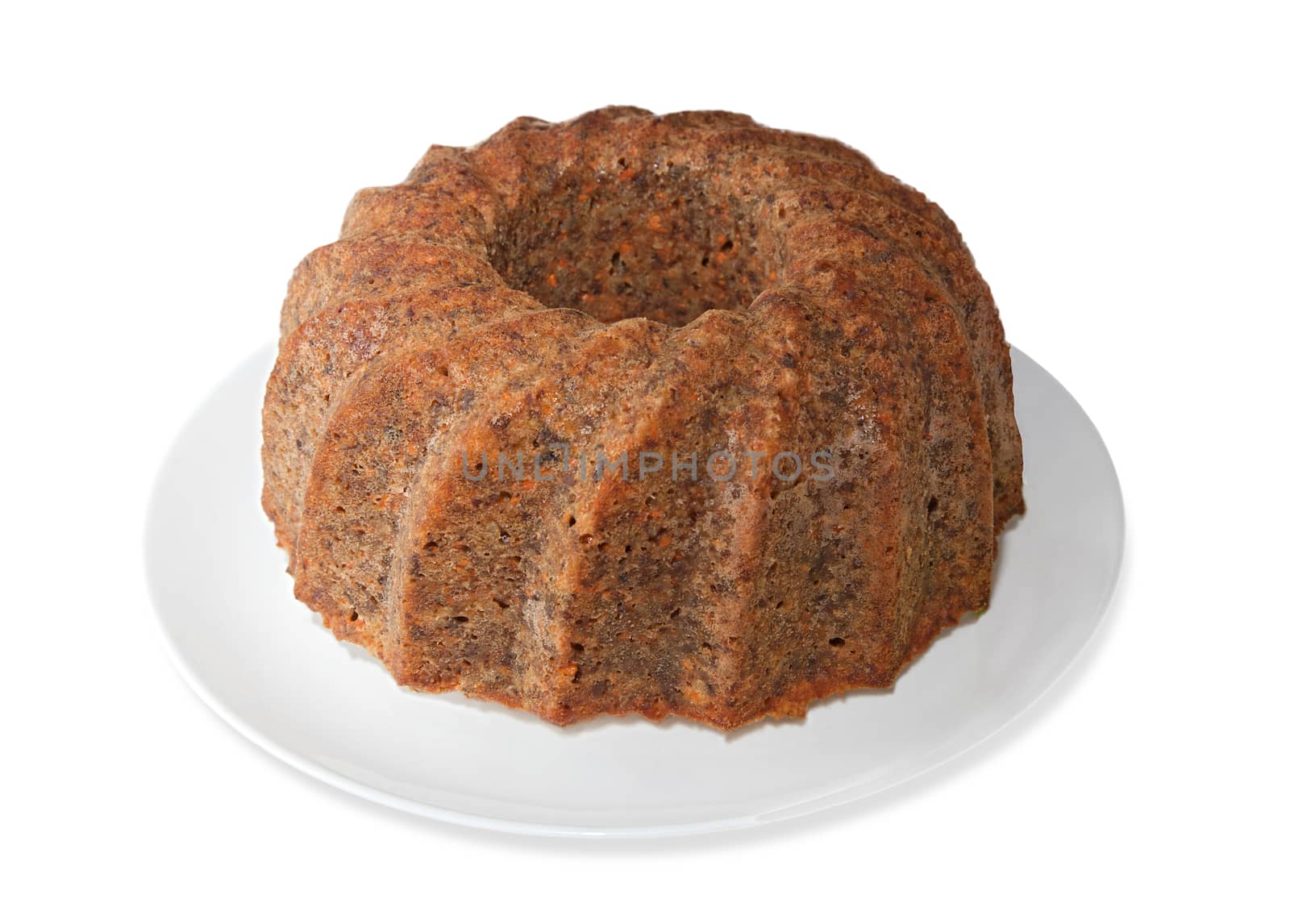 Carrot pie on a plate isolated over white background