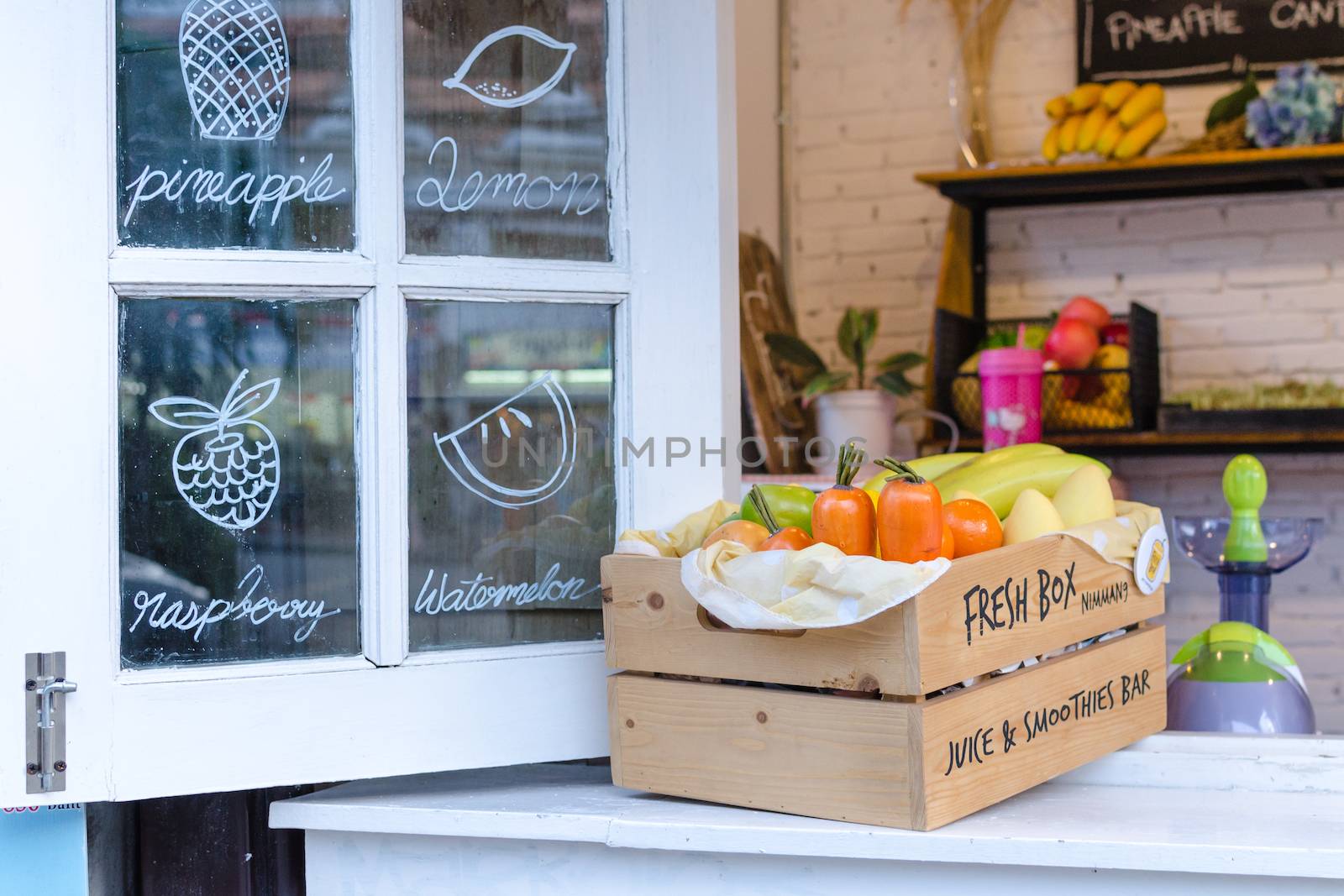 Fruit on windows with various colorful fresh fruits and vegetabl by nopparats