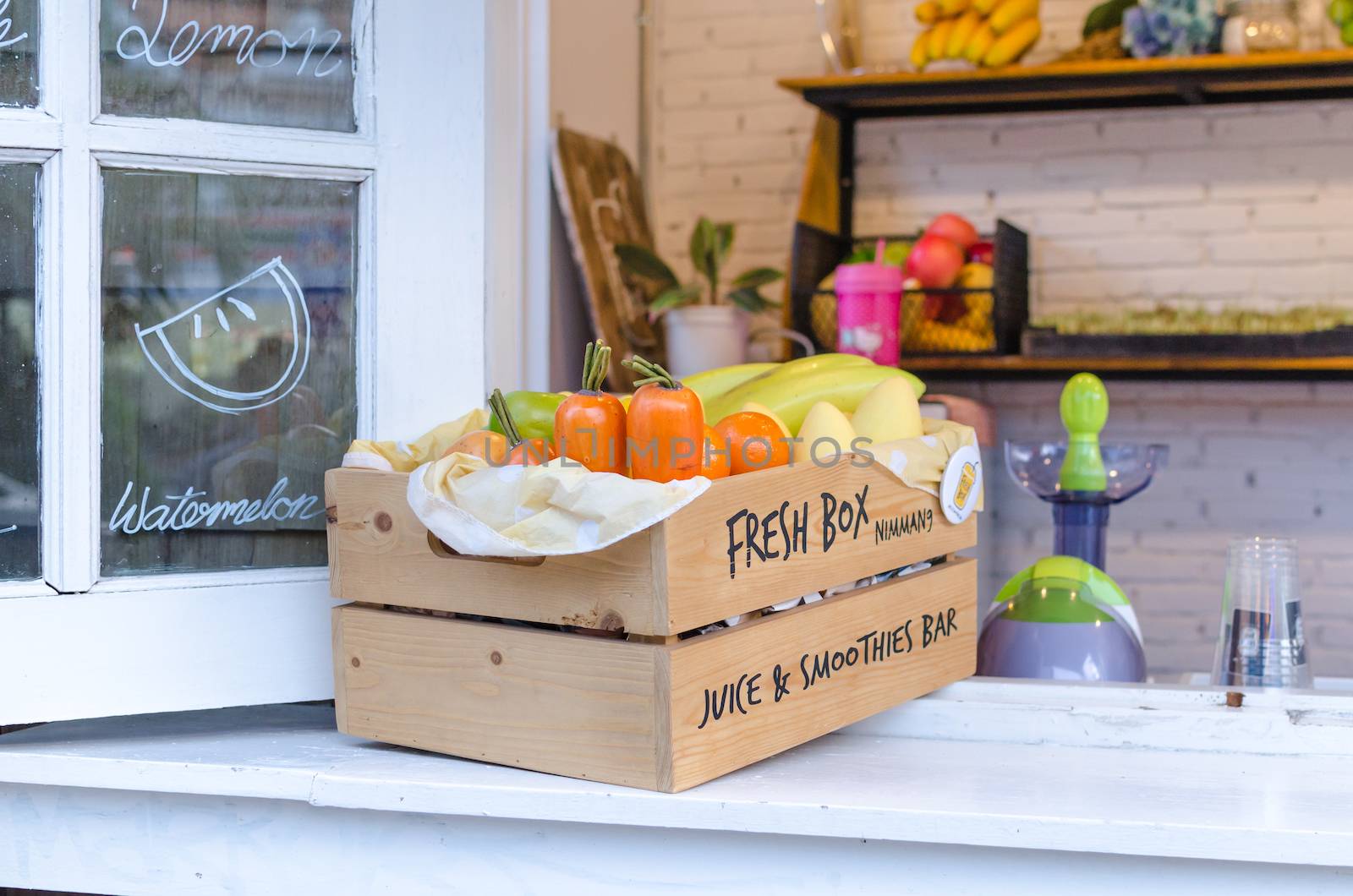 Fruit on windows with various colorful fresh fruits and vegetables .