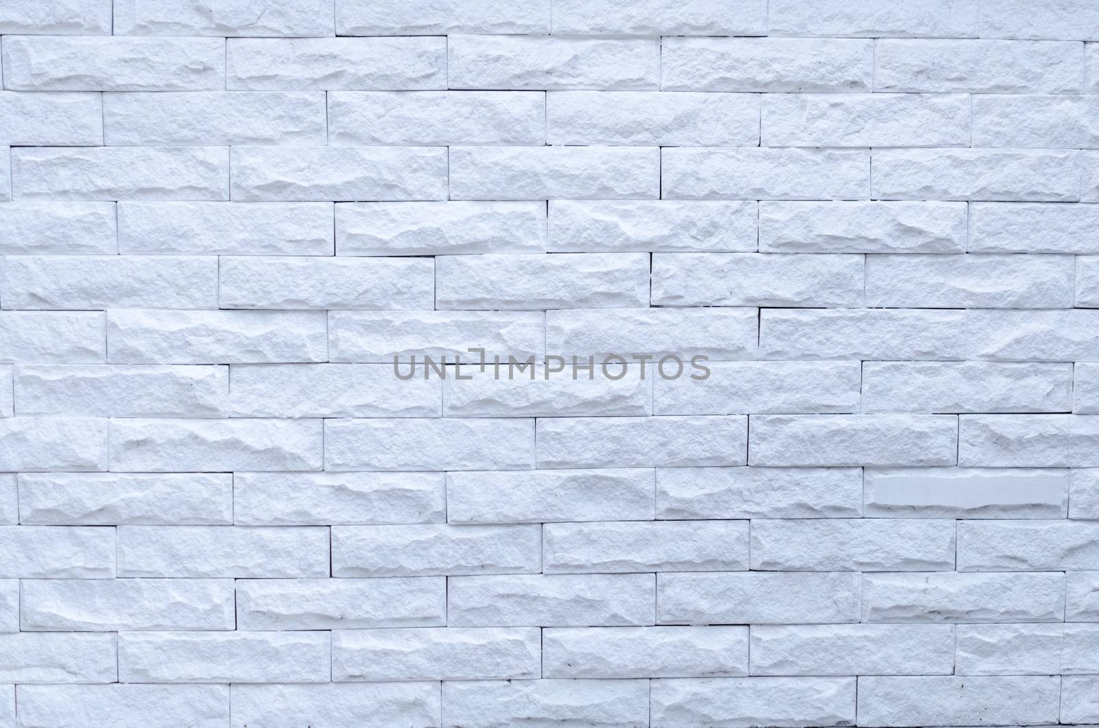 White grunge brick wall background by nopparats