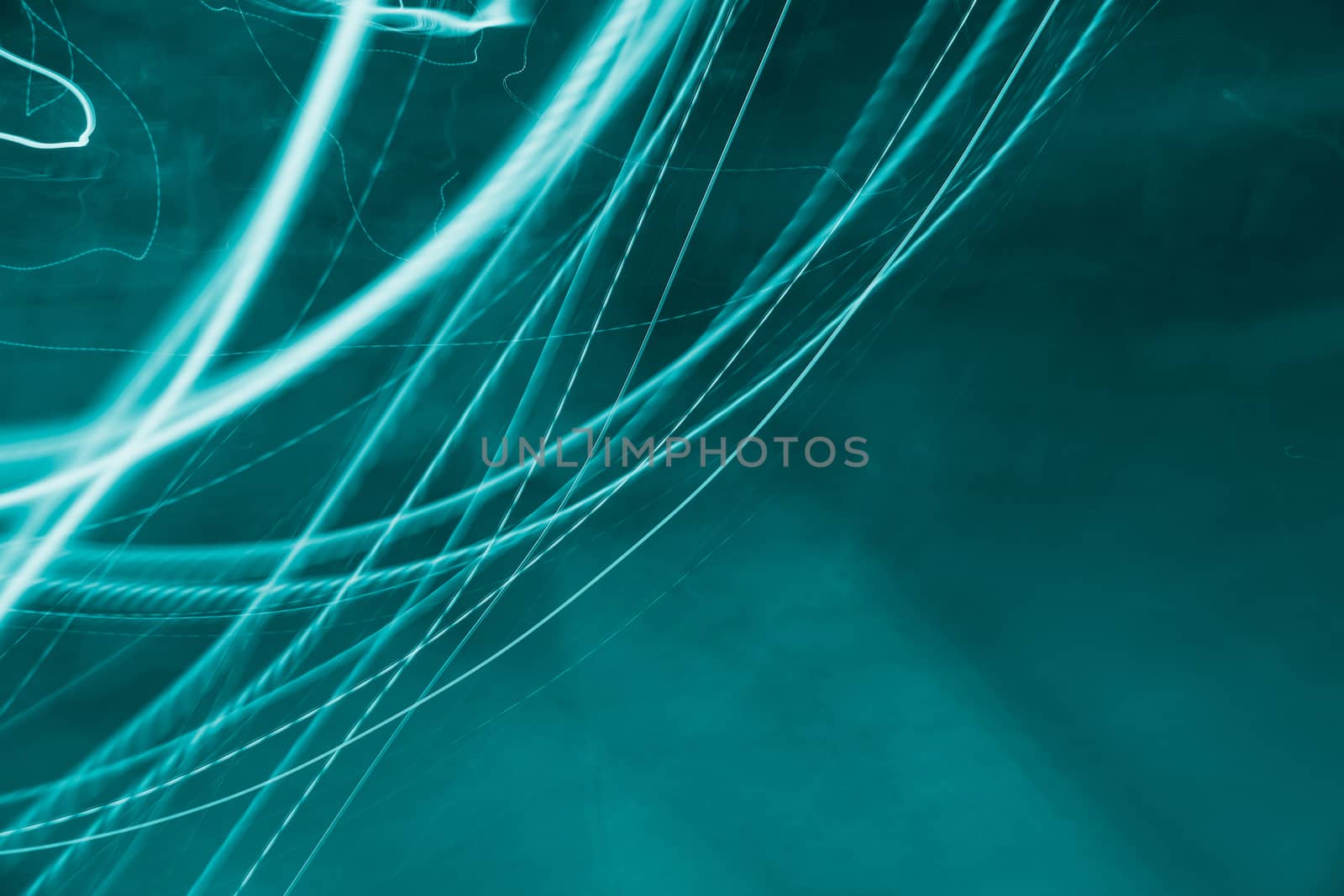 View of abstract lights on green background