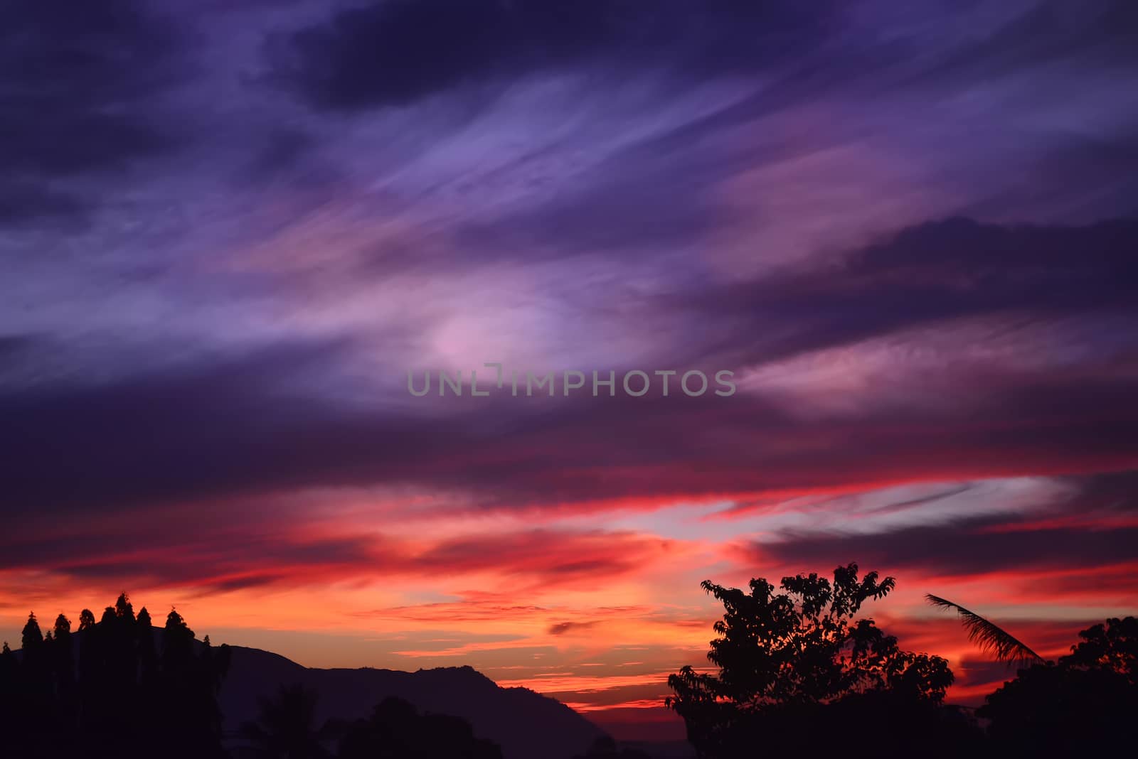 Beautiful purple orange sunset in a war-torn place.