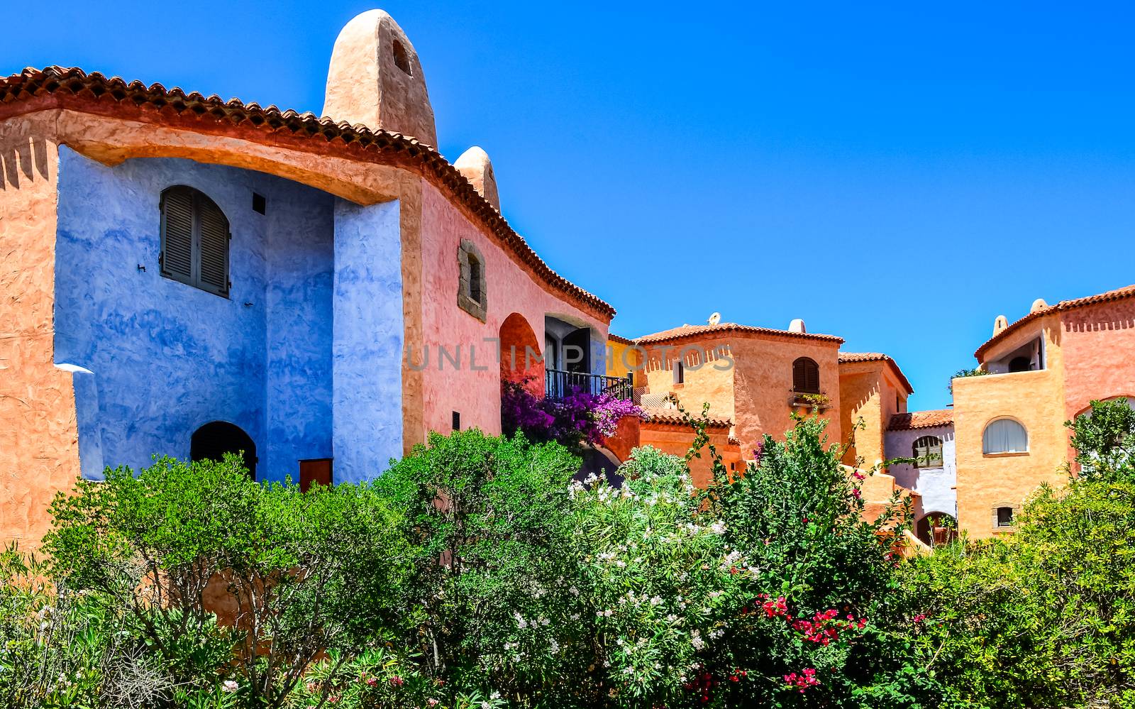 Beautiful colorful houses with nice garden, Porto Cervo, Sardinia, Italy