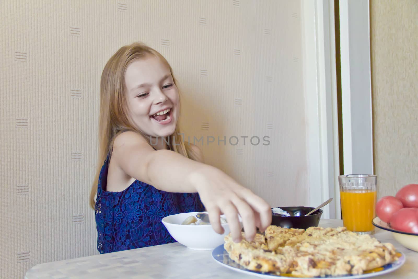 Photo of eating cute girl with blond hair
