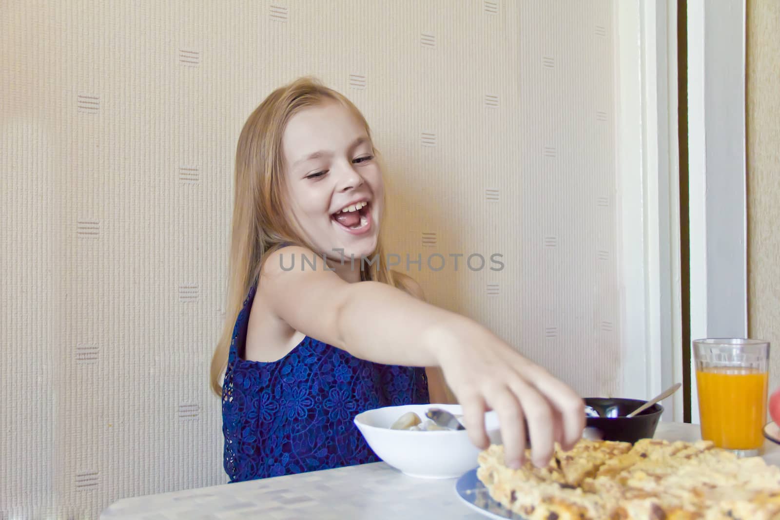 Photo of eating cute girl with blond hair