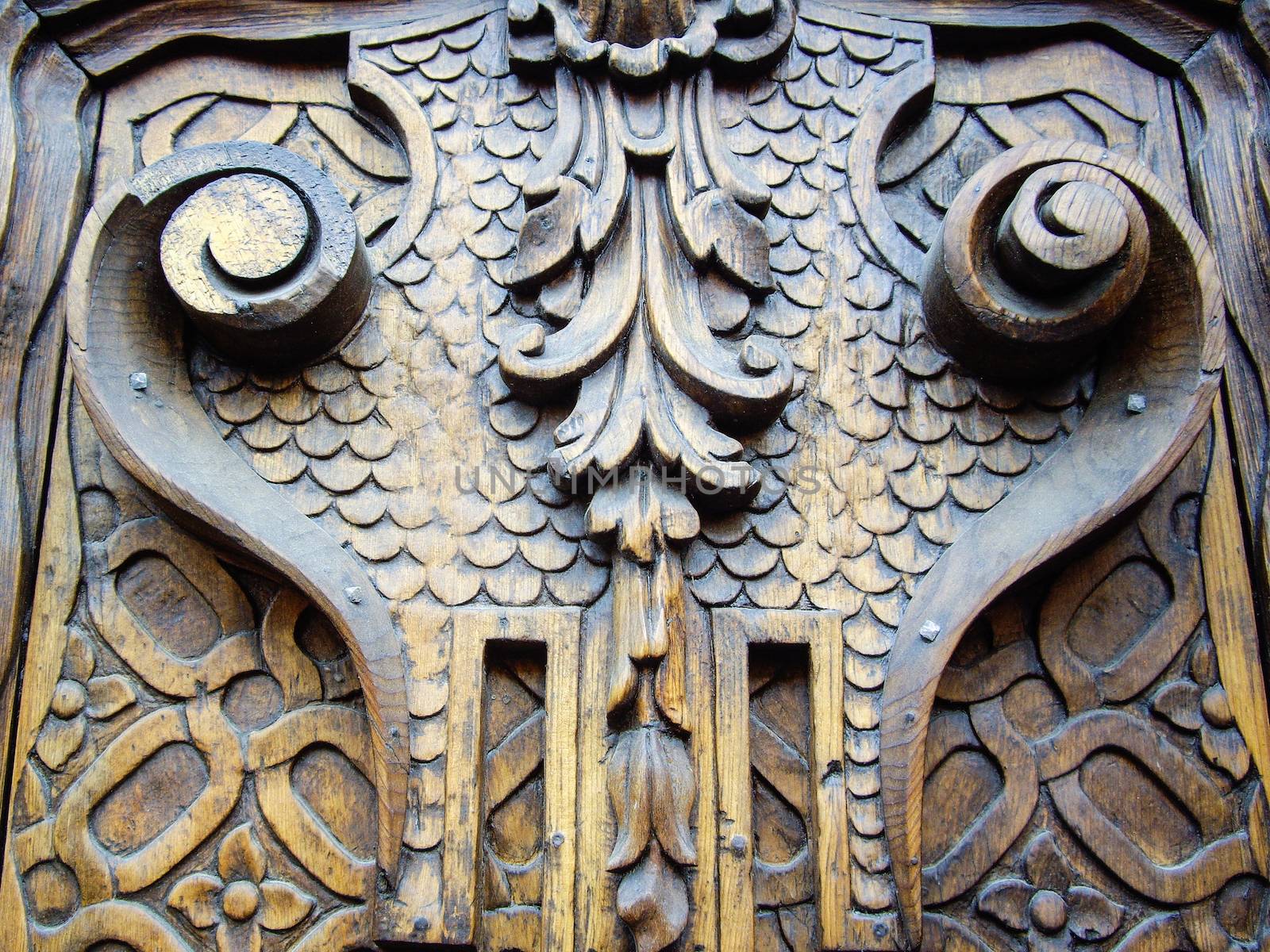 Old carved wooden door by emattil