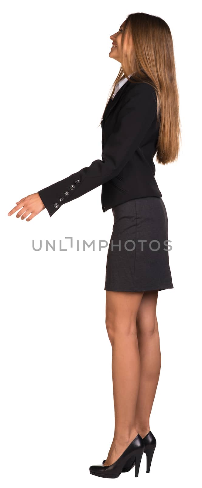 Businesswoman walks forward. Isolated on the white background