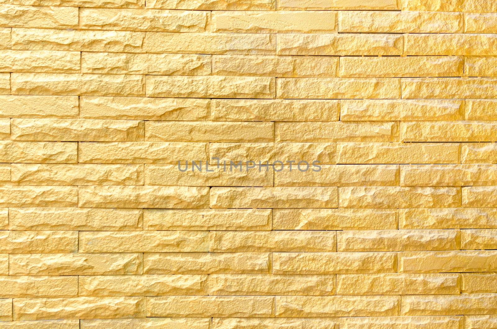 golden brick wall background pattern texture.