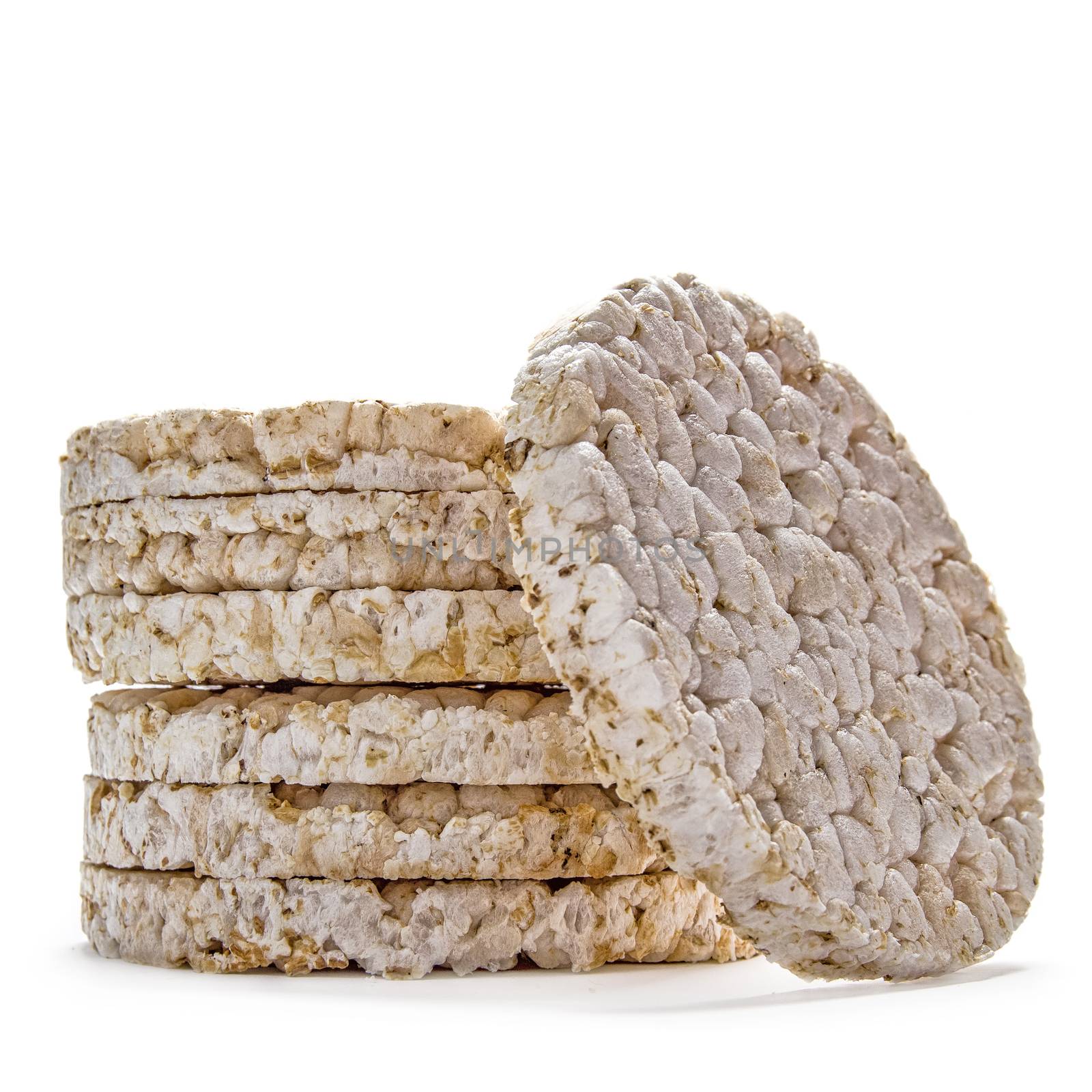 Pile of rice crackers on wite background