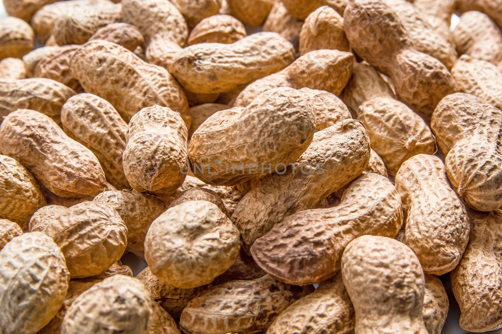 Pile of peanuts in shell background