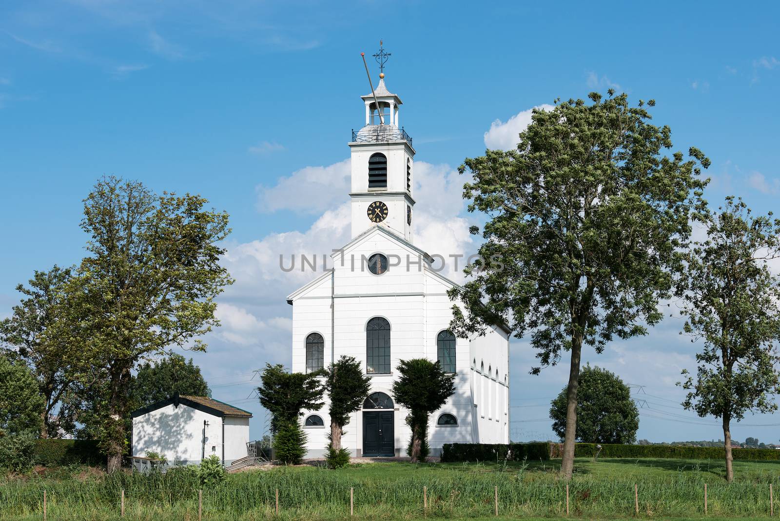 white christian church in holland by compuinfoto