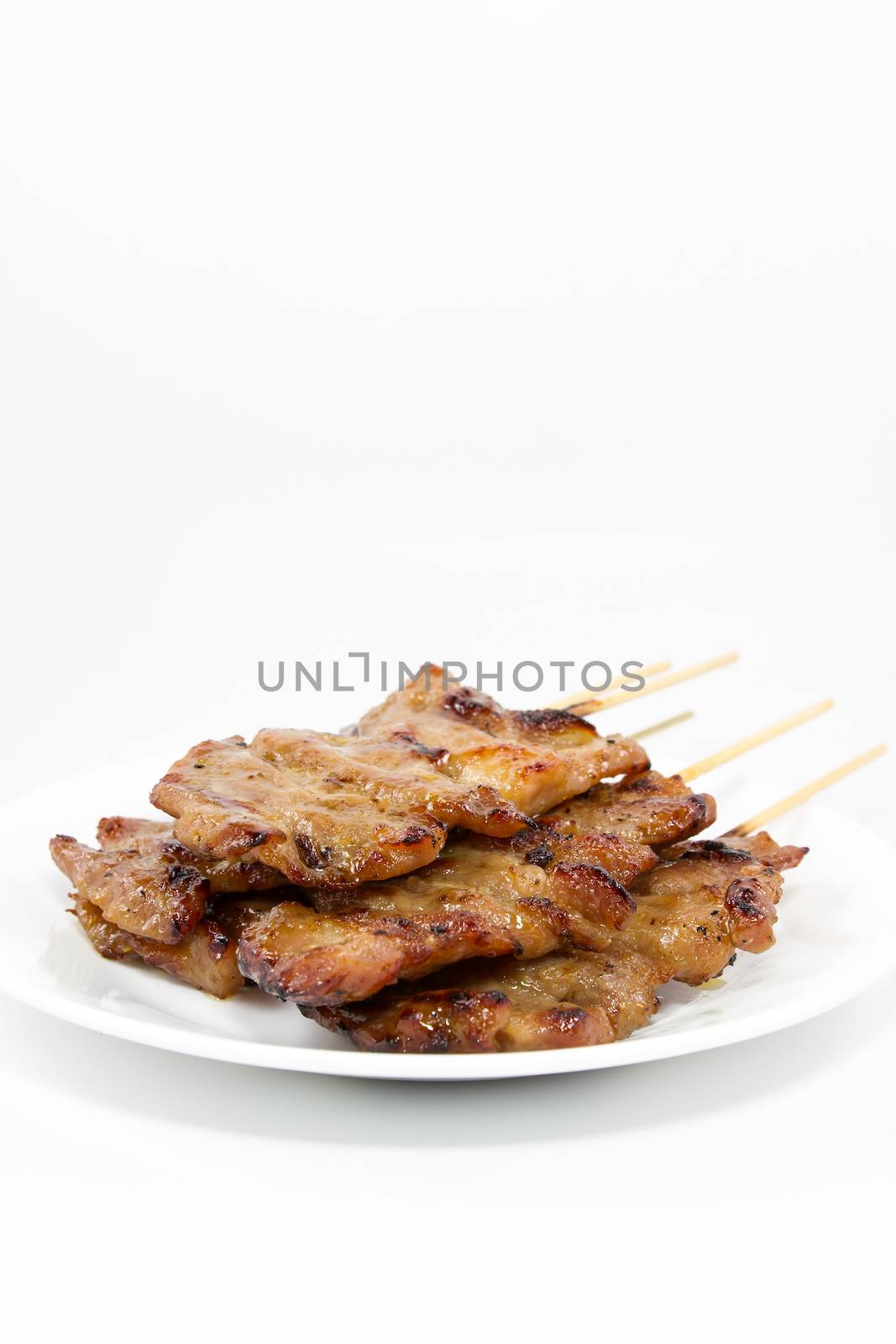 Traditional Thai style grilled pork isolated on white background