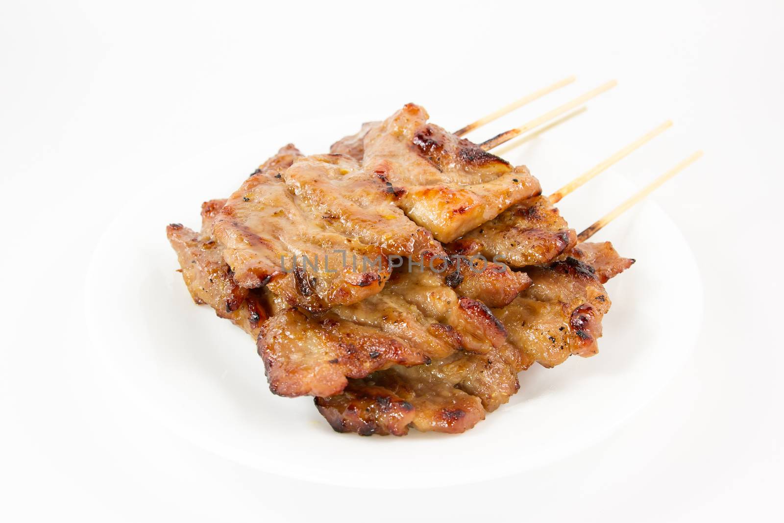 Traditional Thai style grilled pork isolated on white background