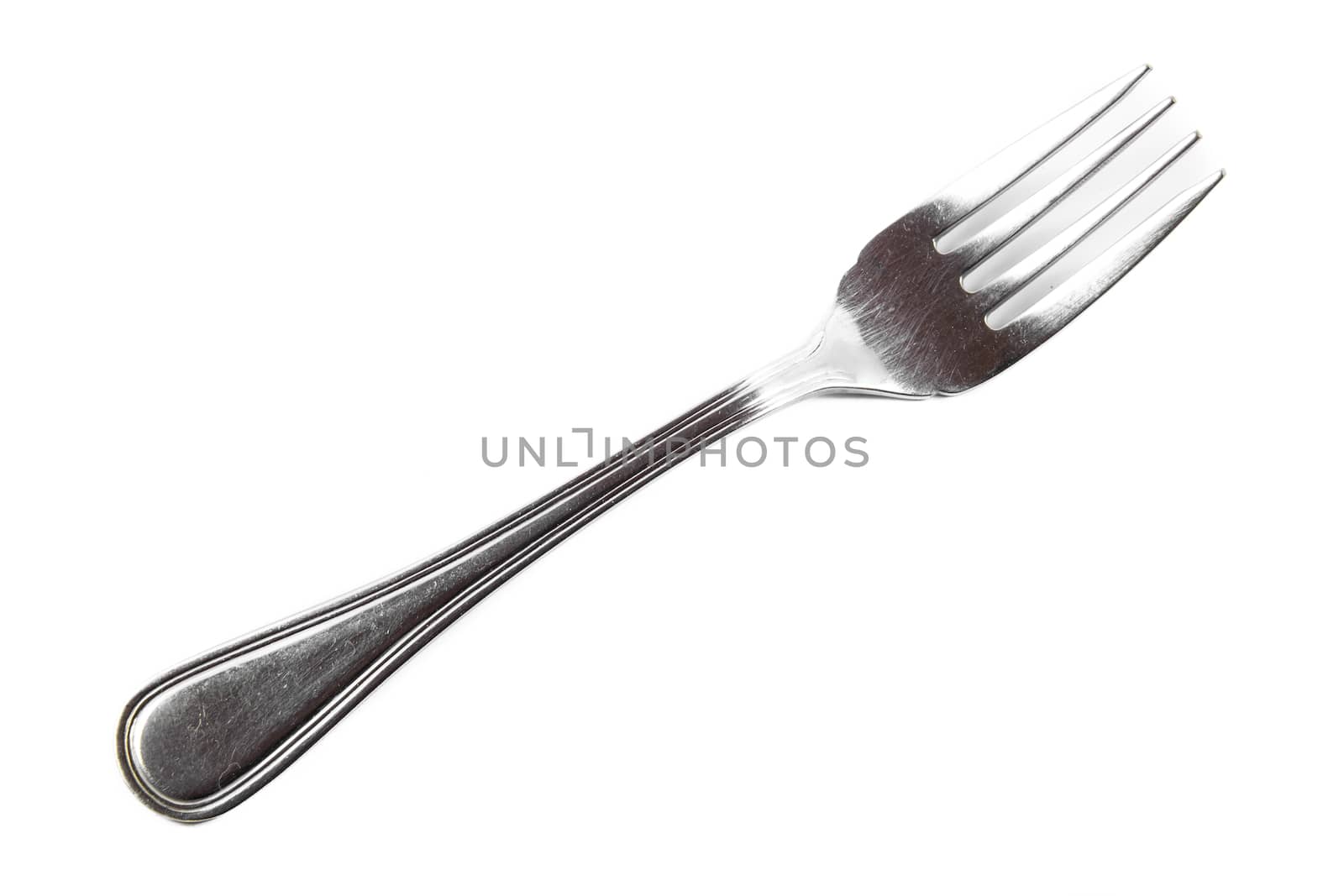 Closeup view of fork isolated on white background