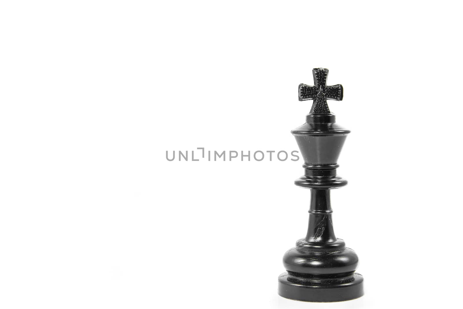 Black chess king isolated on white background