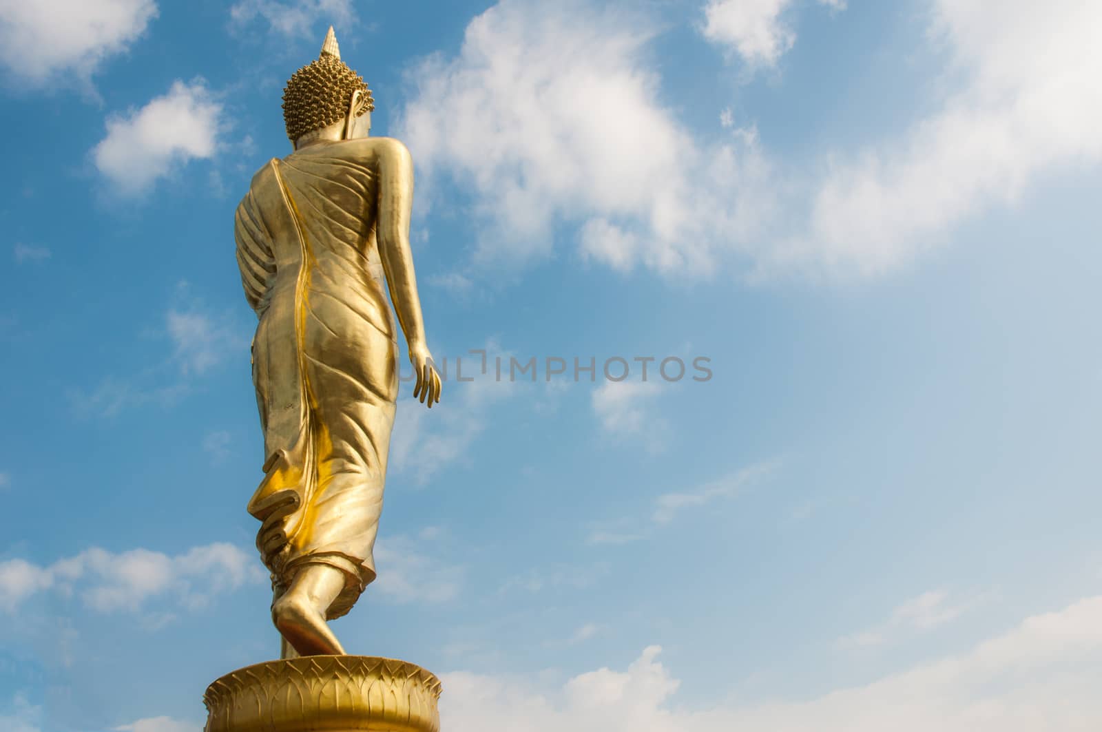 Buddha standing on a mountain Wat Phra That Khao Noi, Nan Province, of Thailand