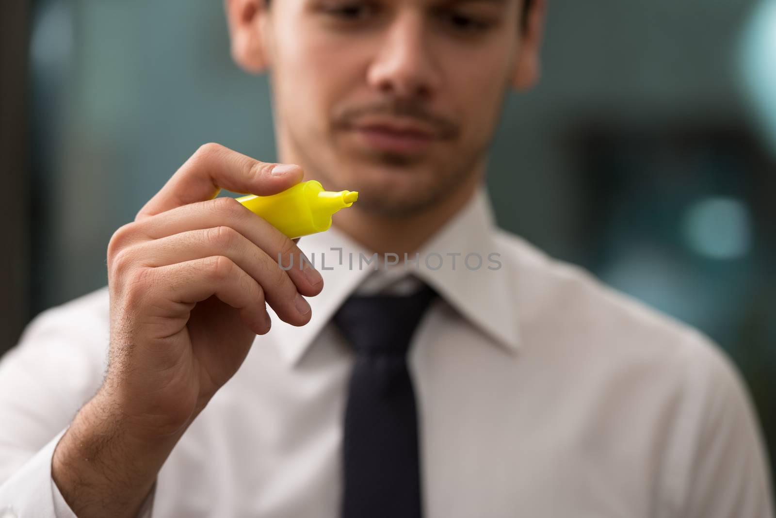 Businessman Is Writing On A Virtual Whiteboard Flipchart by JalePhoto