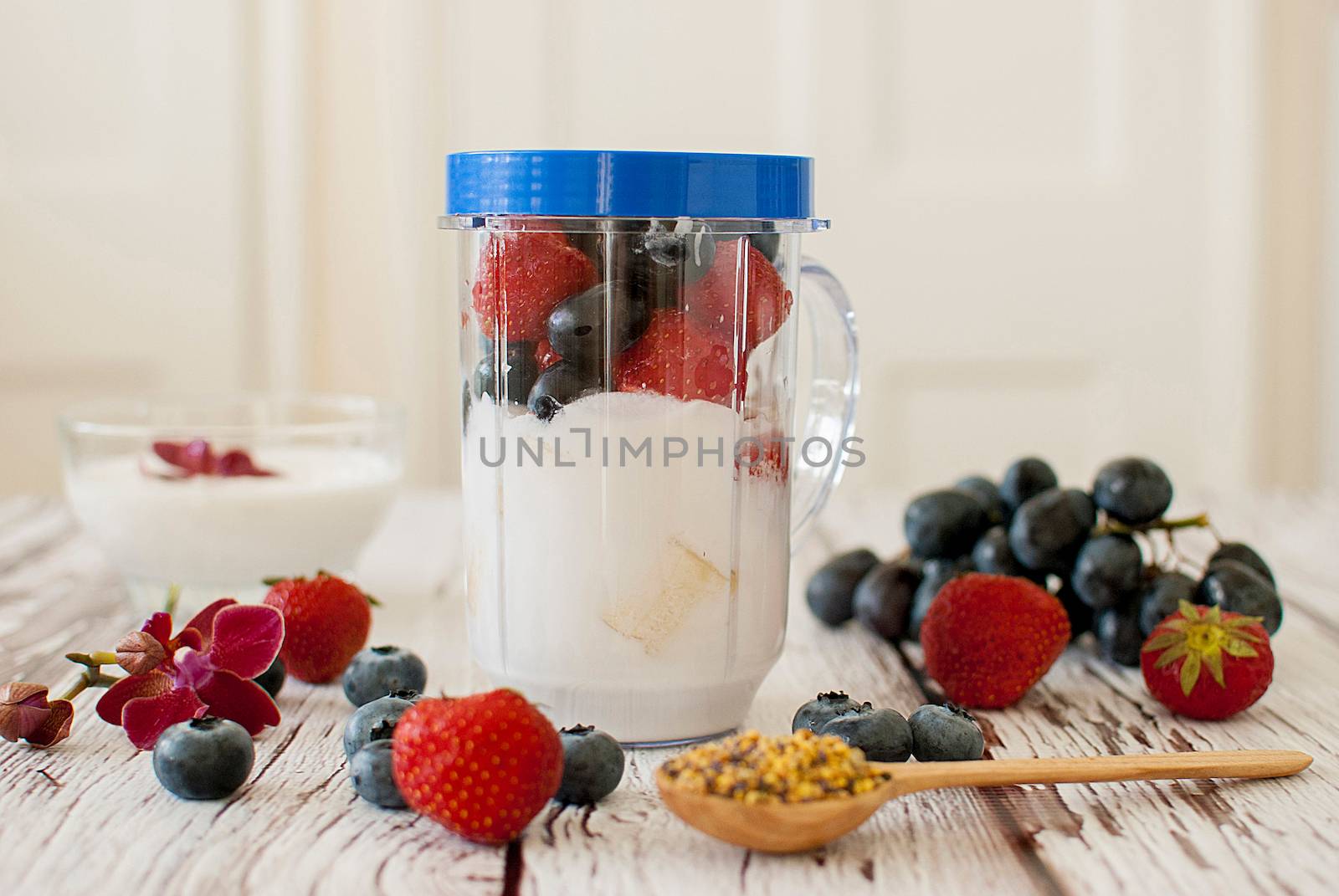 healthy organic fruit and nuts smoothie on wooden board