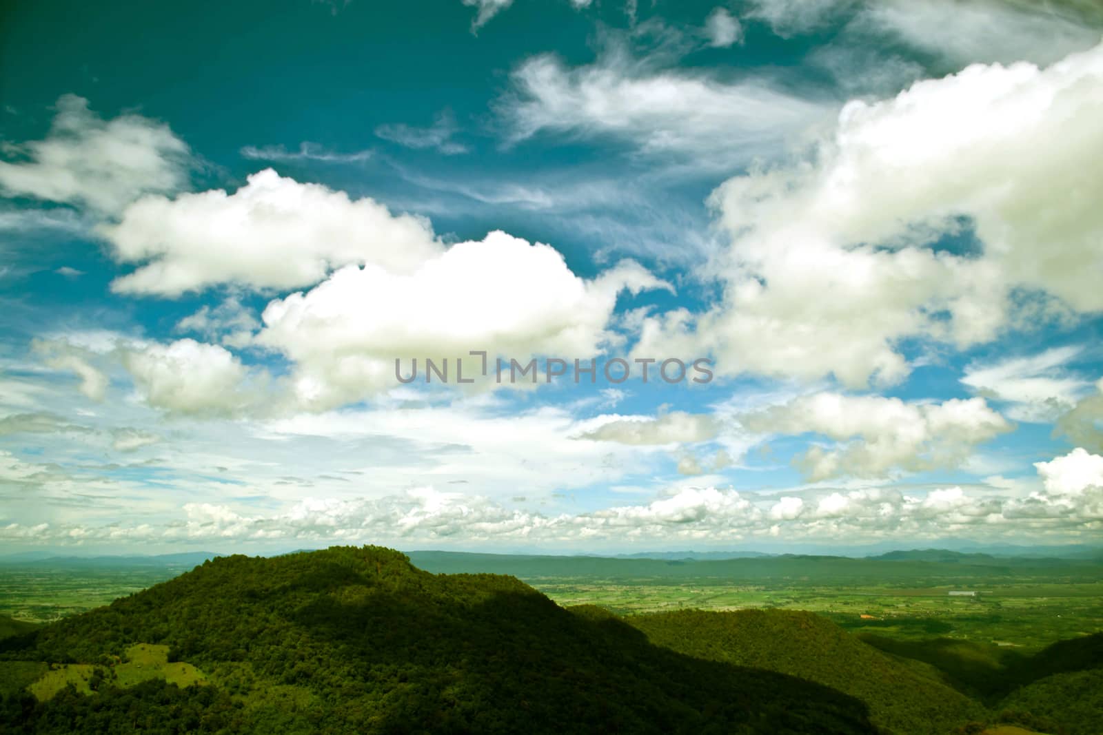 mountains green grass and blue sky landscape by Thanamat