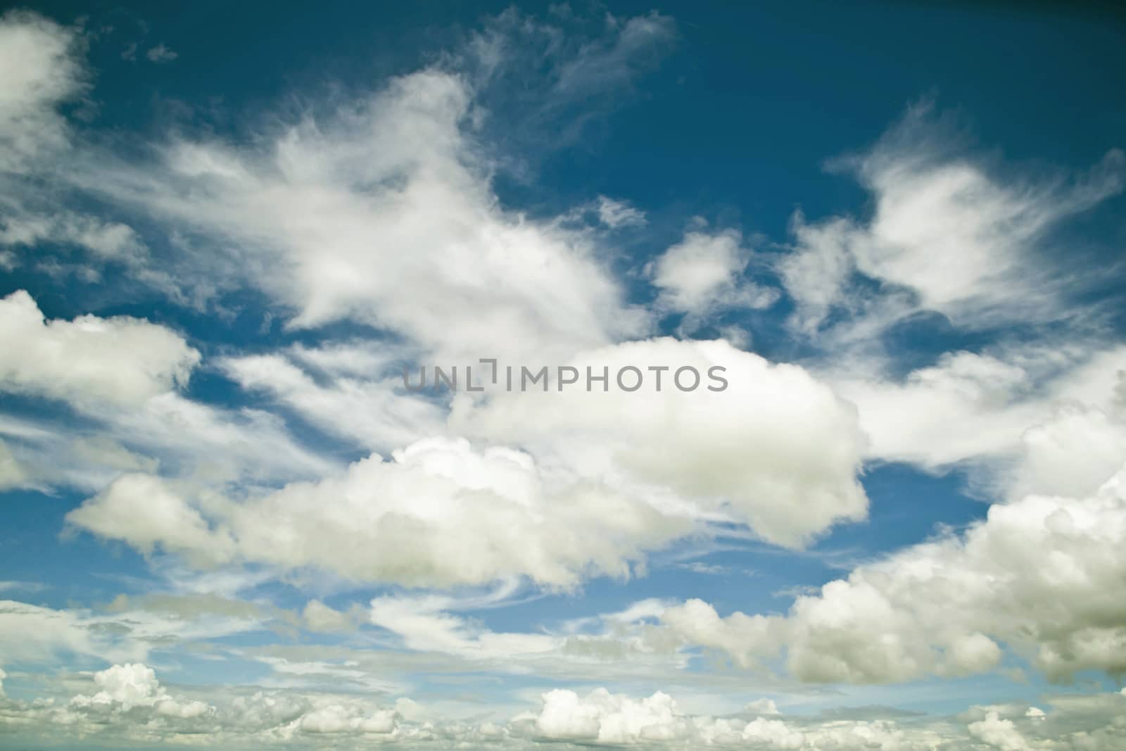 clouds in the blue sky by Thanamat