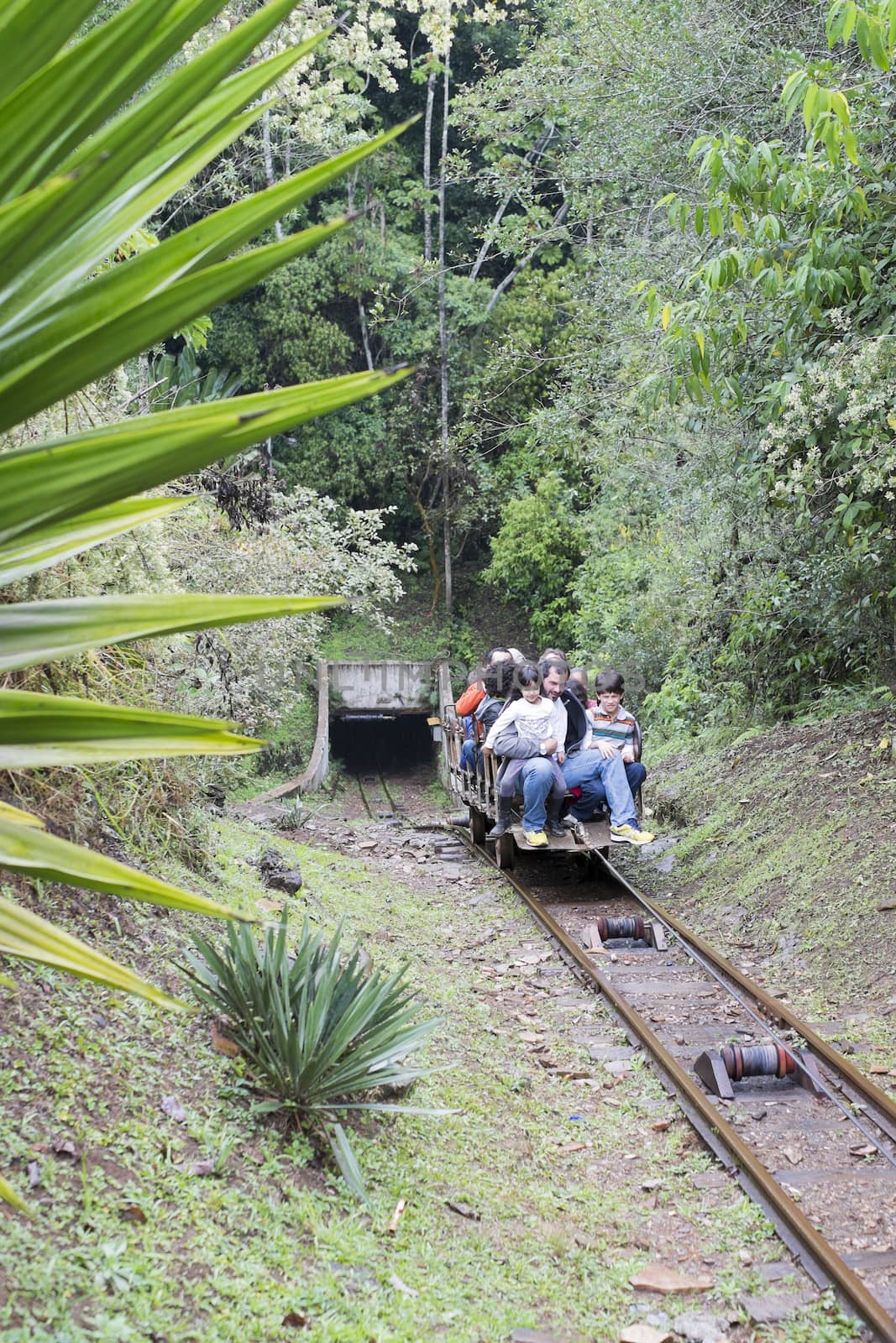 OURO PRETO, BRAZIL - JULY 14: Tourists cable car descend into the Passage Mines. Connecting two cities it is the largest disused gold mine open to visitation in the world. July 27, 2014 in Ouro Preto.