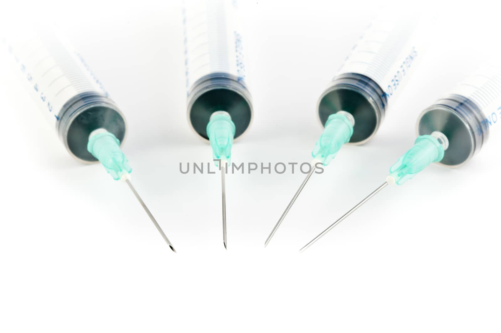 Studio shot of Four Syringe with copy space on bottom