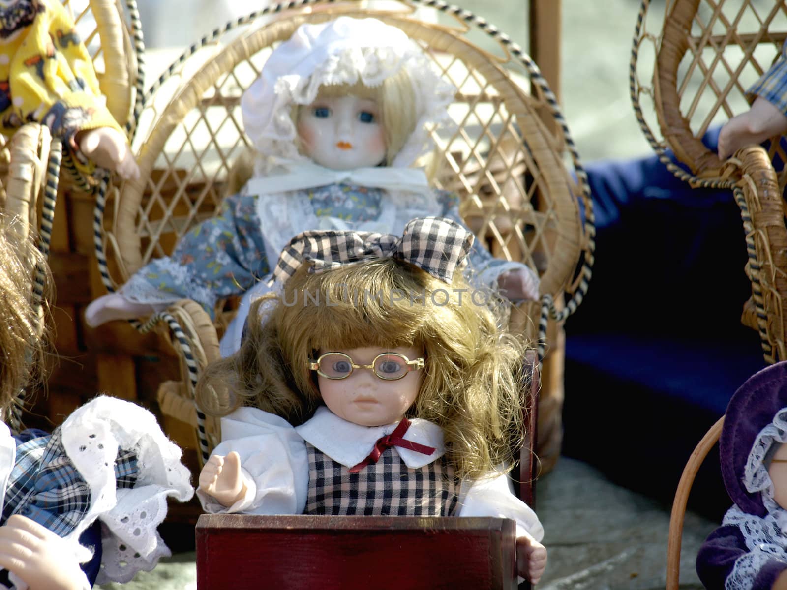 Old dolls for sale at antiques fair    