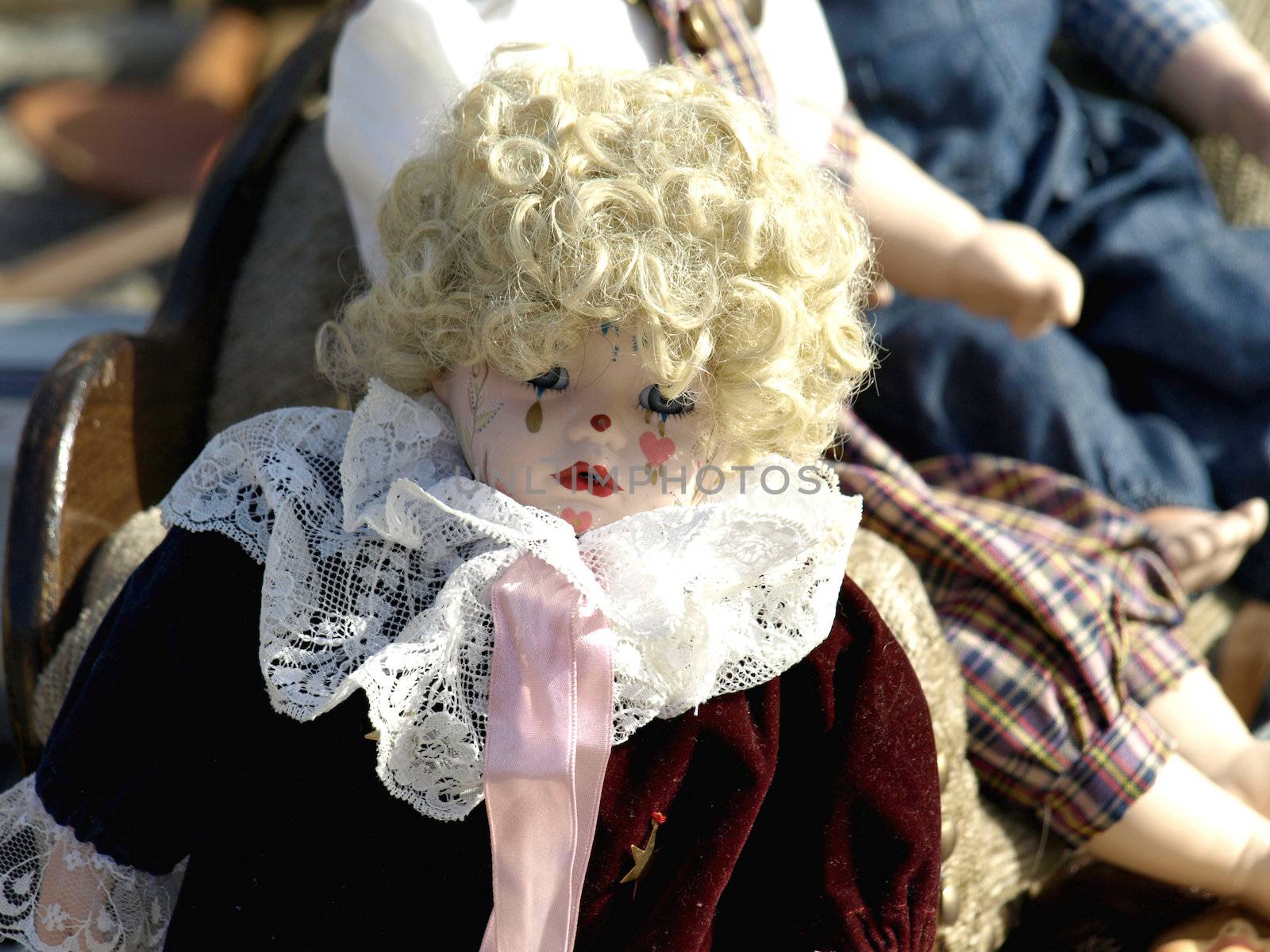 Old dolls for sale at antiques fair         
