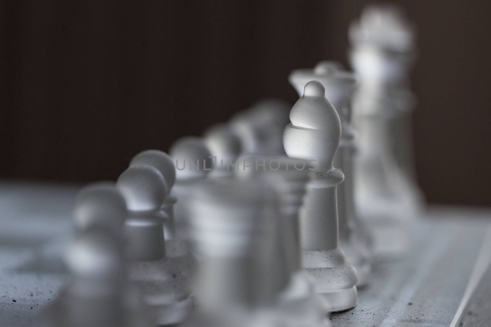 dusty chess figures that look abandoned