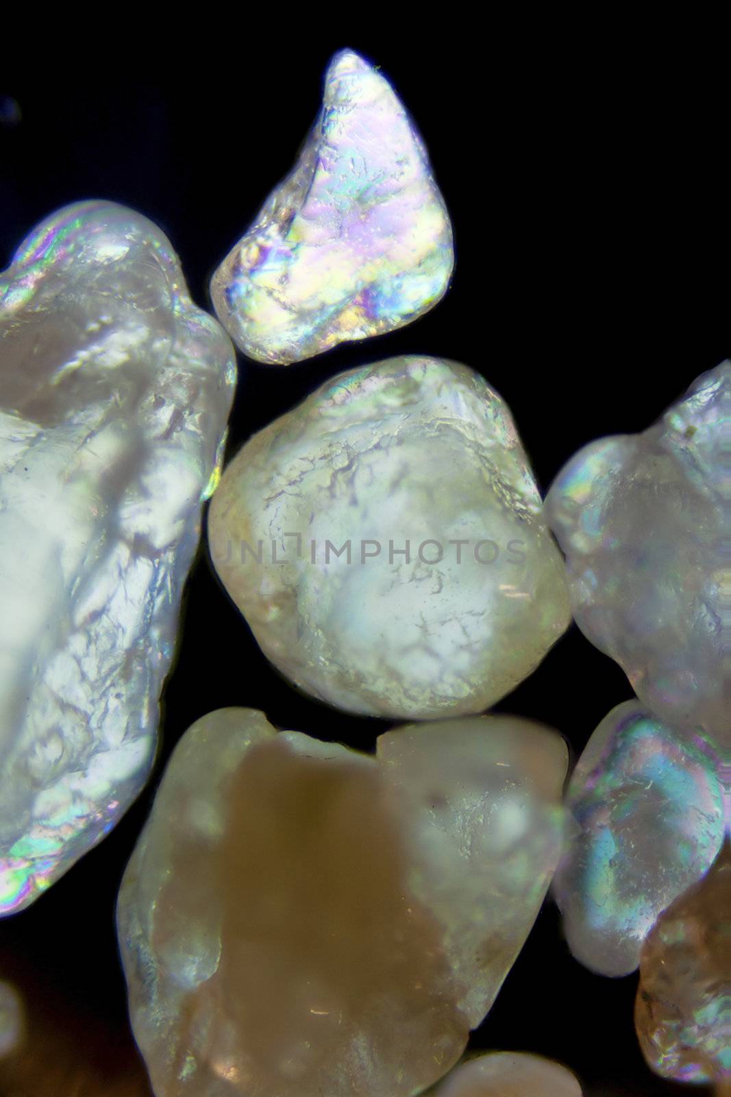 Micro photography of sand grains in polarized light