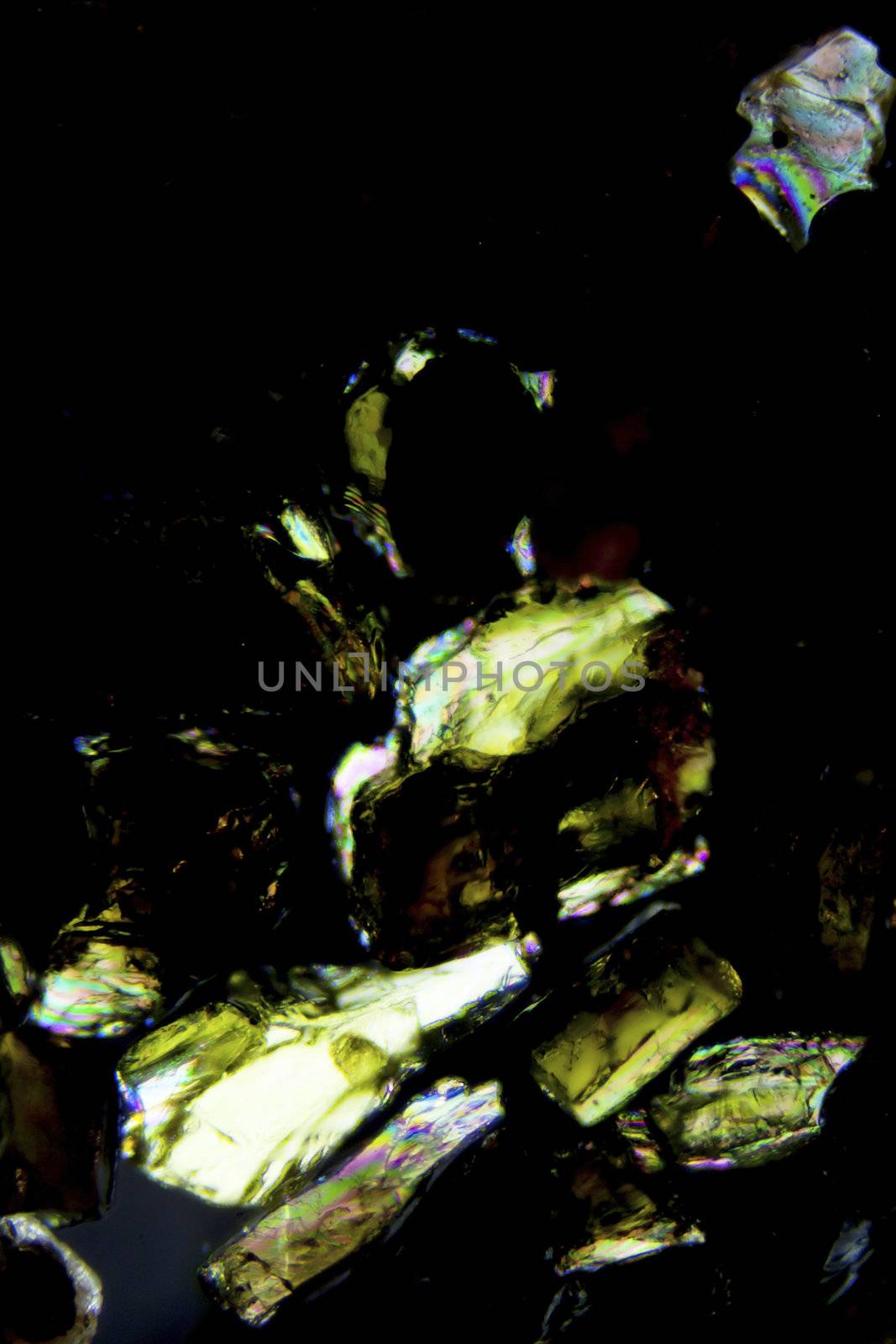 Micro photography of sand grains in polarized light