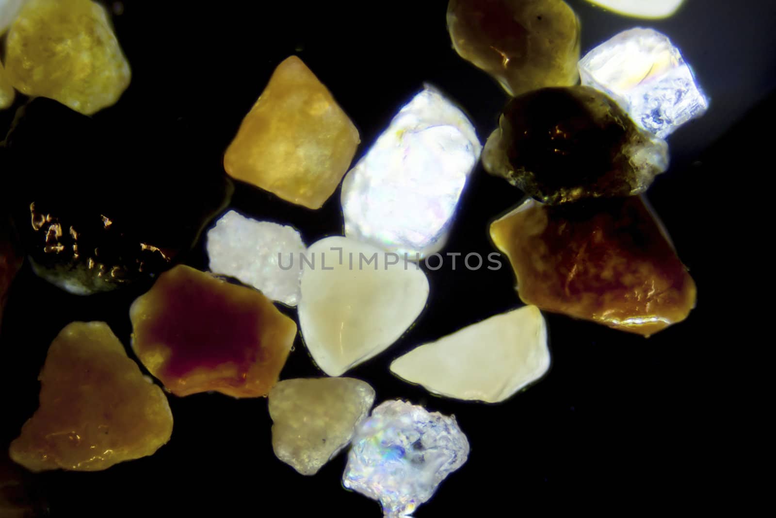 Micro photography of sand grains in polarized light