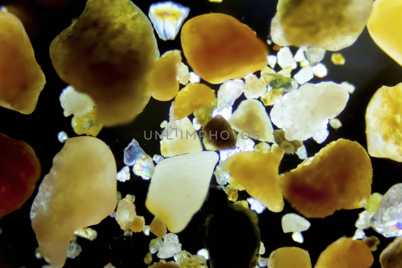 Micro photography of sand grains in polarized light