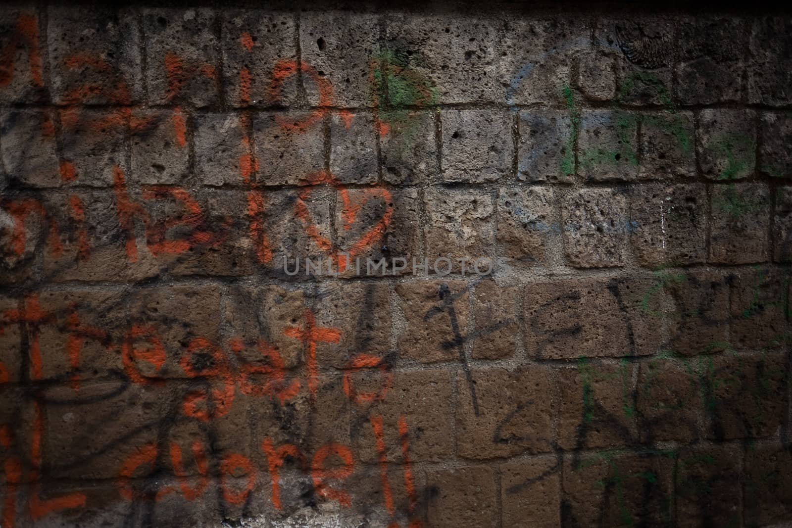 Graffiti on an old, weathered wall