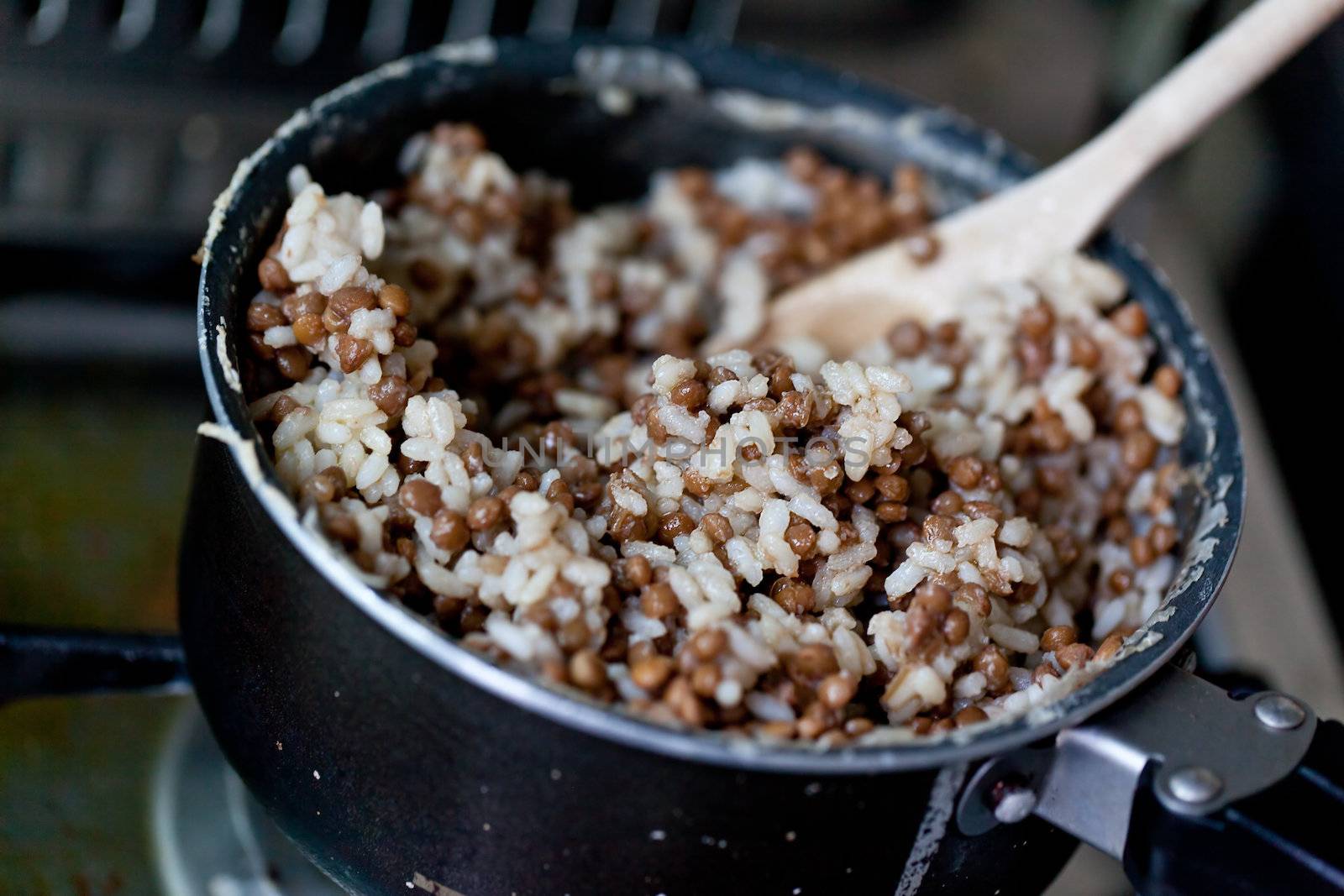 Rice and lentils in a dirty kitchen