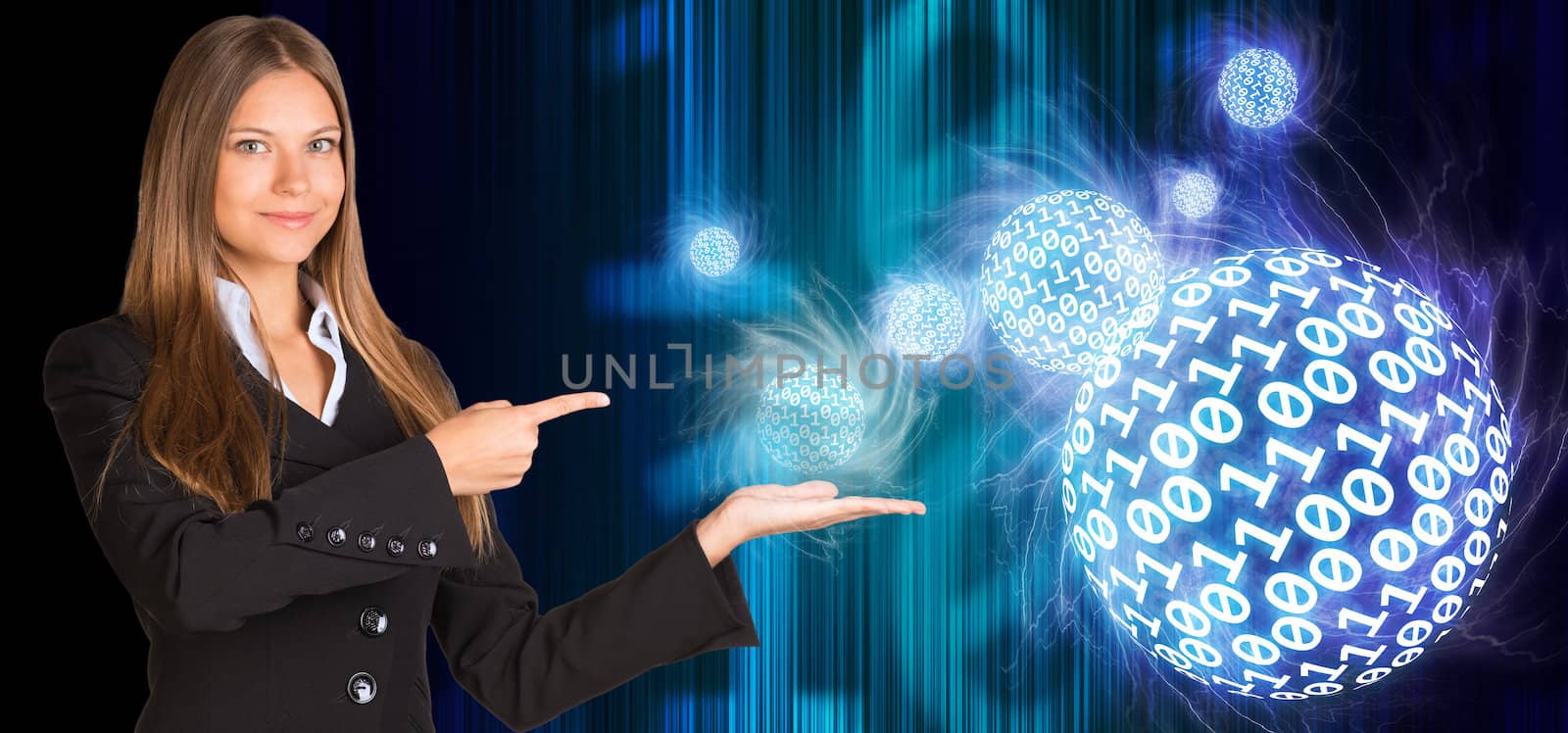 Businesswoman in a suit hold spheres of glowing digits. Dark background