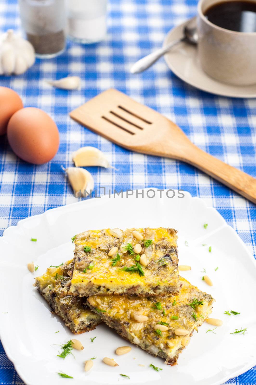 Delicious omlette with sardines and pine seeds