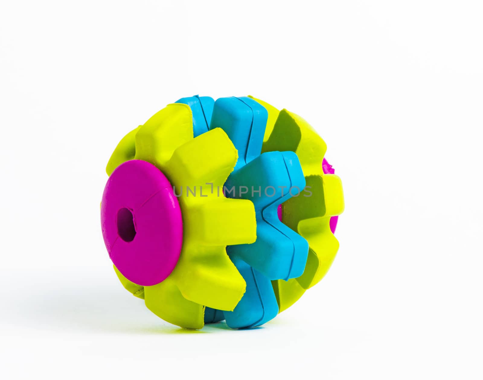 Vivid coloured rubber toy isolated on white background