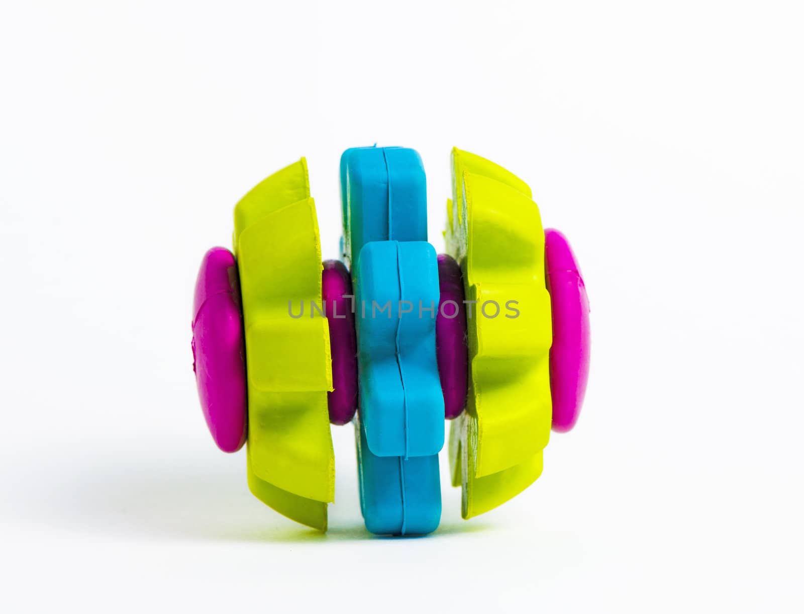 Vivid coloured rubber toy isolated by marius_dragne