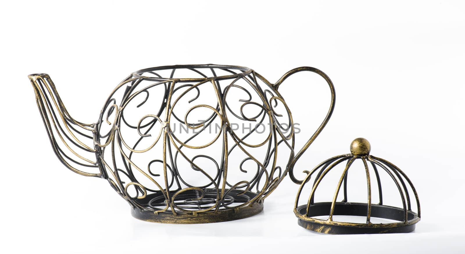 Metal wireframe teapot on white for decoration