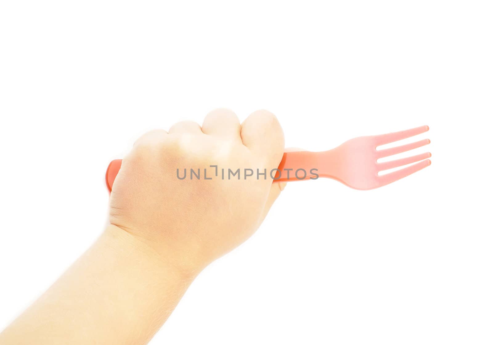 Child holding a red plastic fork towards white