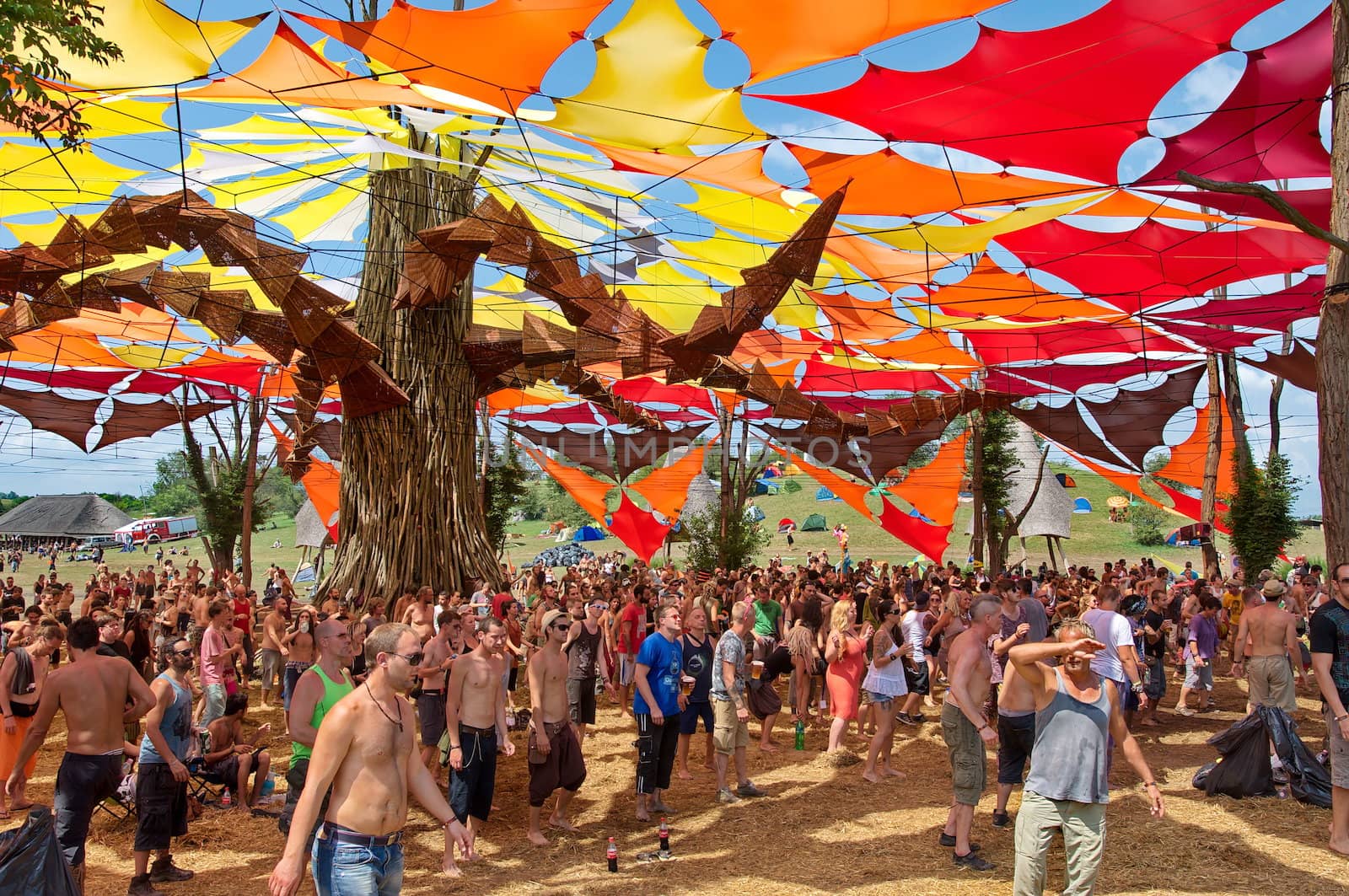 OZORA, HUNGARY - AUGUST 01: People dancing on Ozora Festival, one of the greatest psychedelic music gathering in Euorpe. Ozora, Hungary, Europe August 01, 2014.
