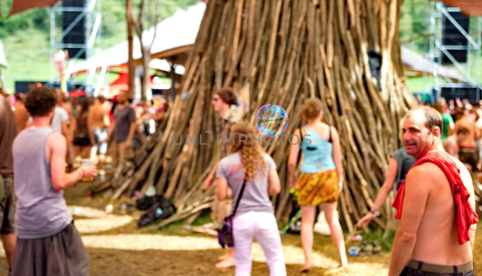 OZORA, HUNGARY - AUGUST 01: Man watching bubles on Ozora Festival, one of the greatest psychedelic music gathering in Euorpe. Ozora, Hungary, Europe August 01, 2014.