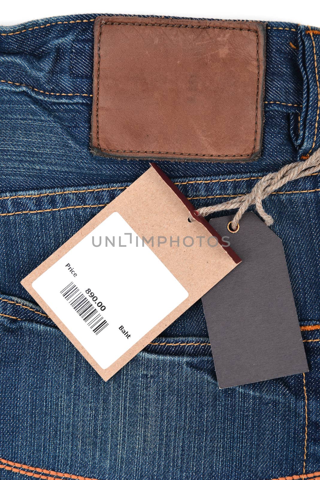 price tag with barcode on  jeans by anankkml