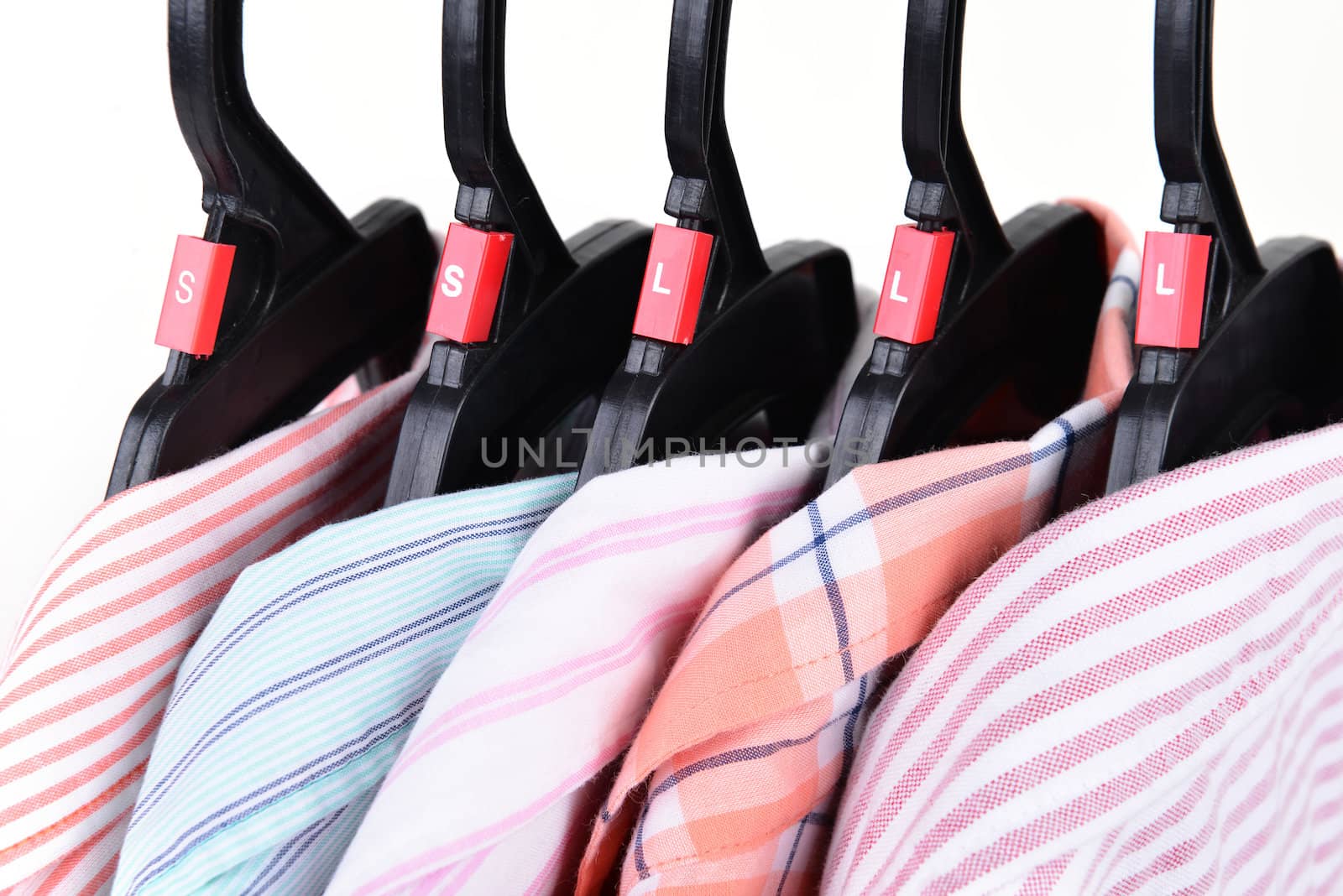 clothes shop with shirt hanged on stand