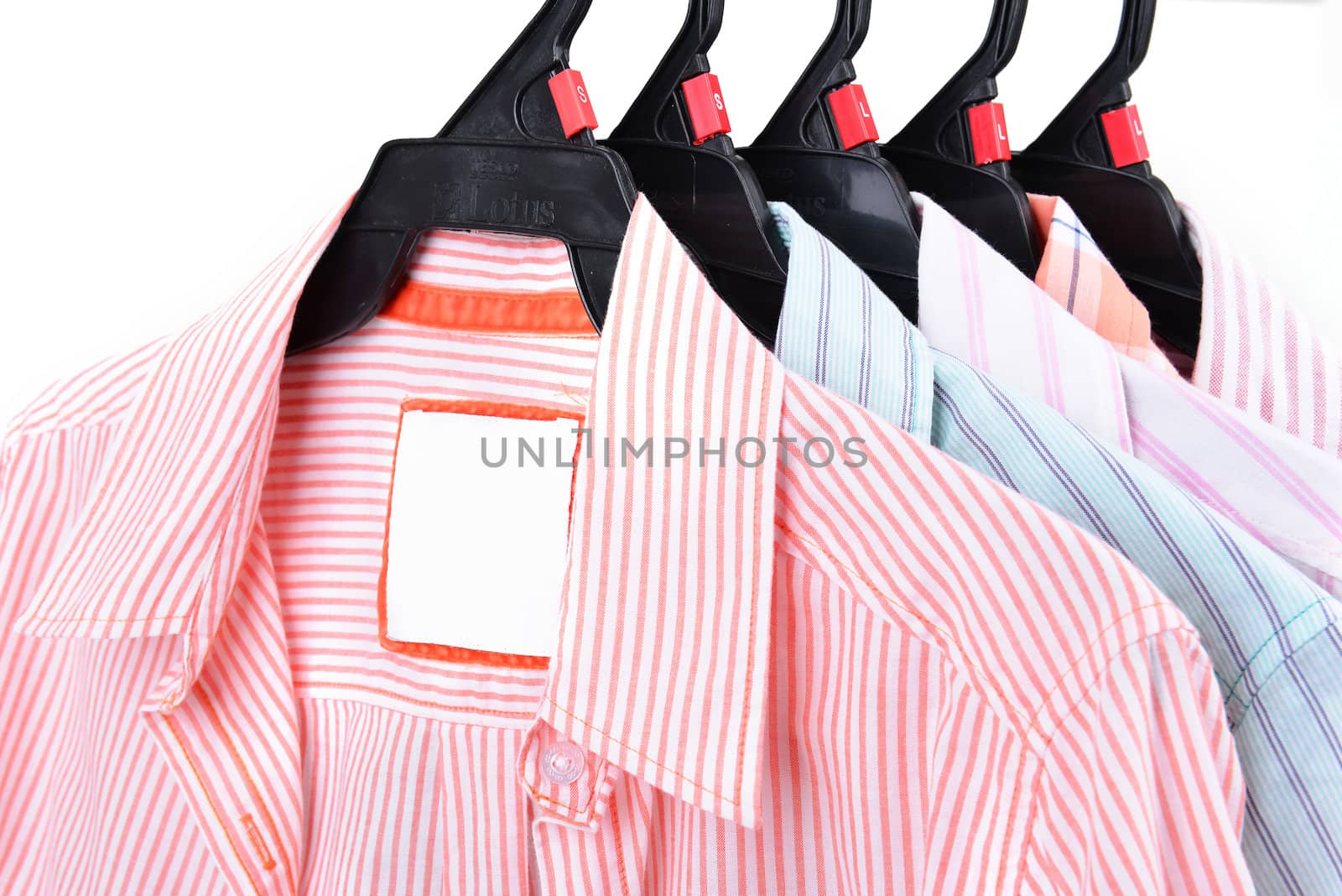 clothes shop with shirt hanged on stand