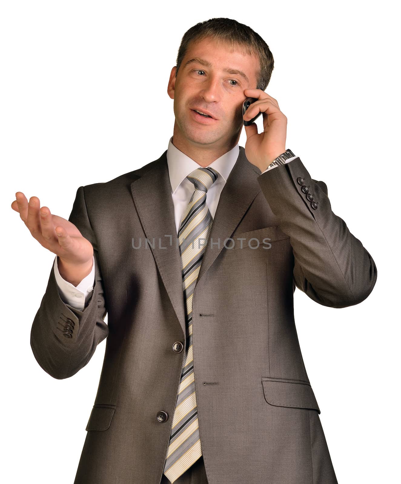 Close up of a laughing businessman on the phone. Isolated on white background