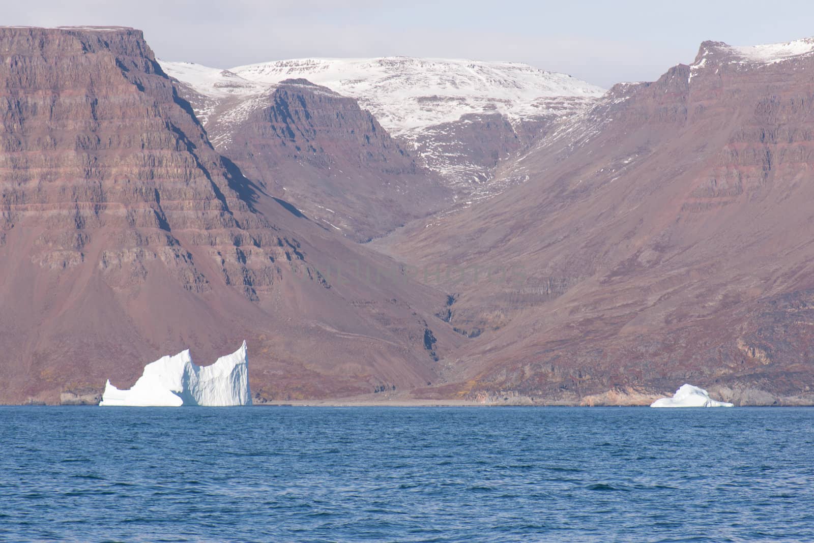 Arctic landscape in Greenland around Disko Island with high mountain