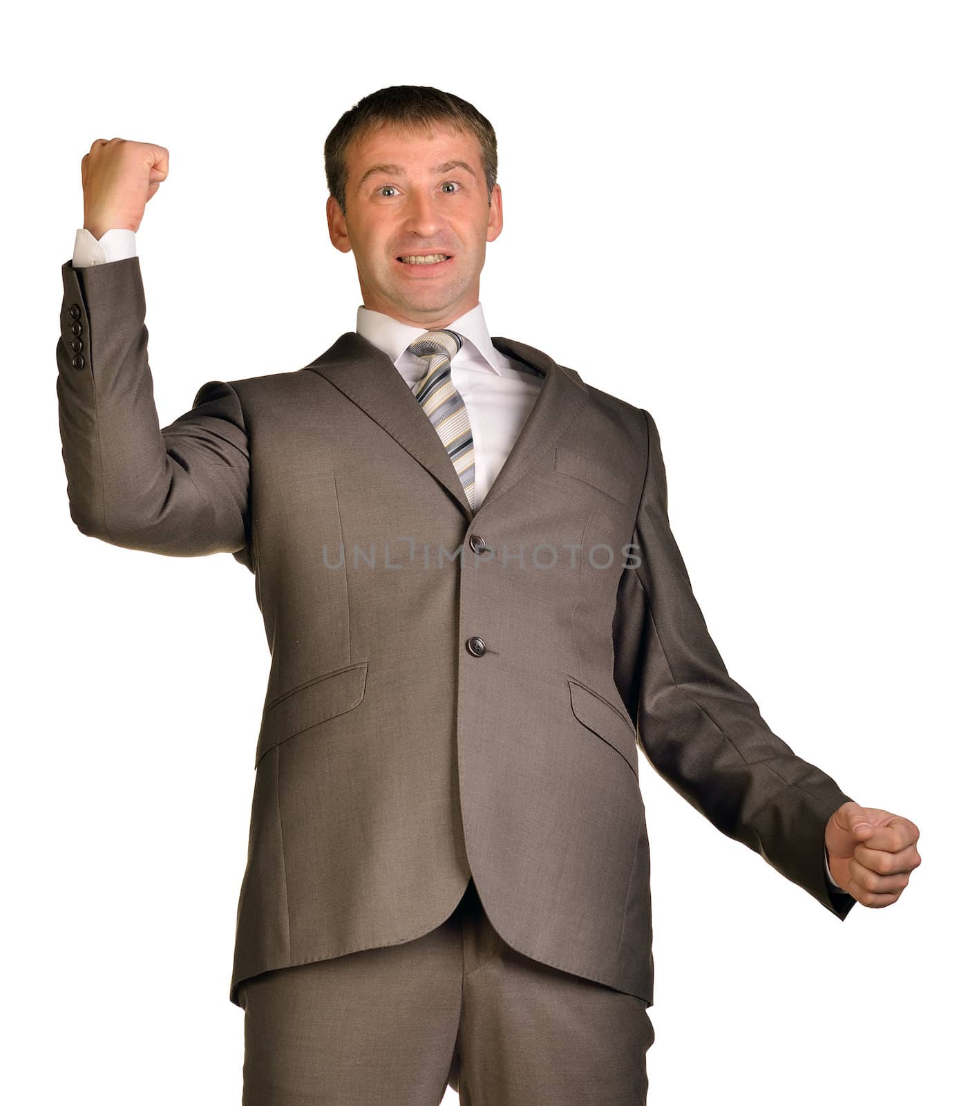 Joyful businessman raised his hands up. Isolated on white
